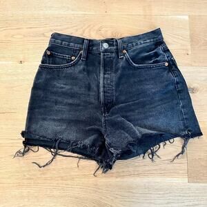 Redone Cut Off Raw Hem Shorts in Black Denim